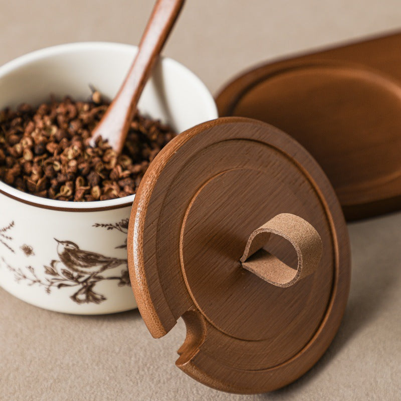 Stylish French-style ceramic seasoning jar with spoon – elegant kitchen condiment container for salt and spices.