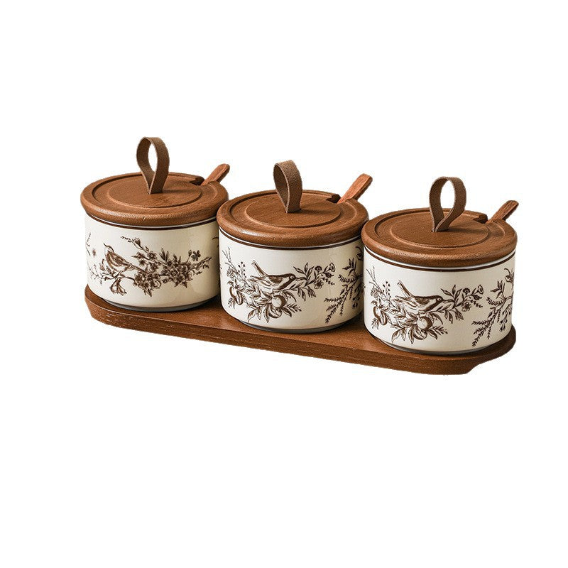 Stylish French-style ceramic seasoning jar with spoon – elegant kitchen condiment container for salt and spices.