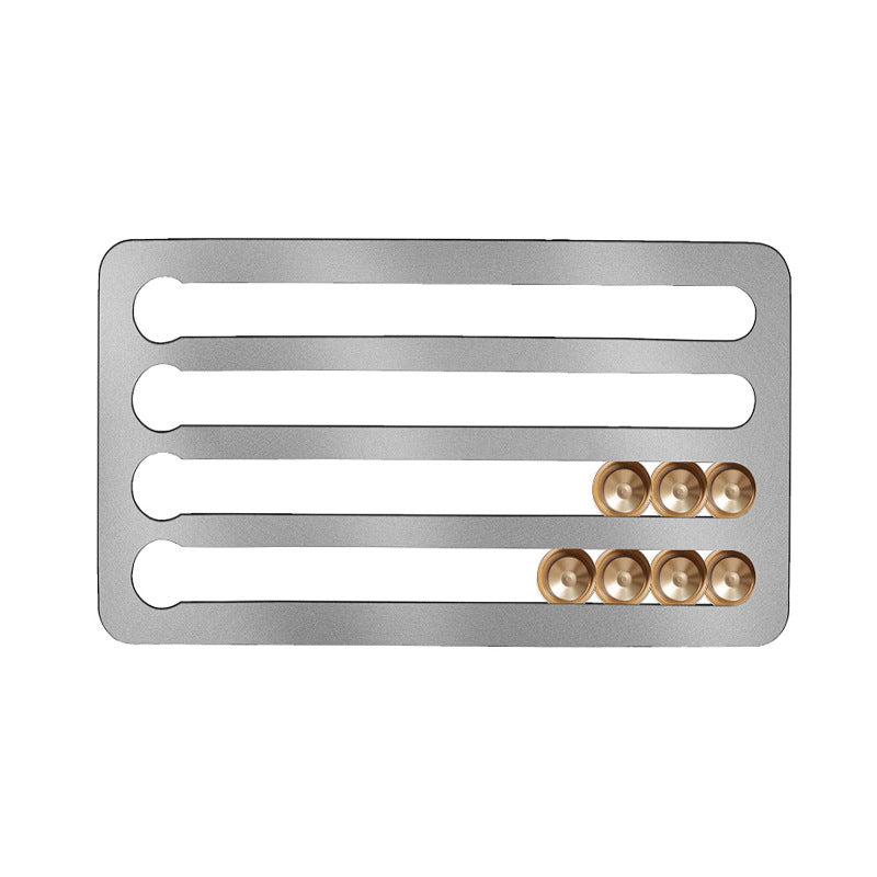 Drill-free stainless steel wall-mounted coffee capsule storage and display rack.